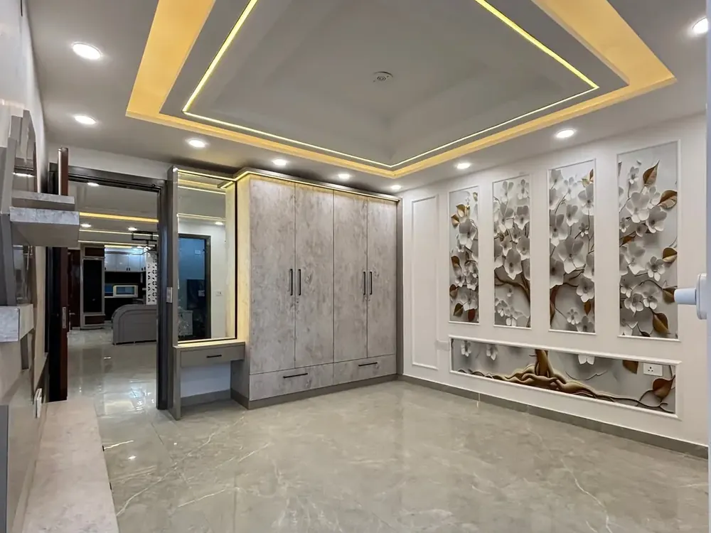 Renovated hall with false ceiling and wardrobe