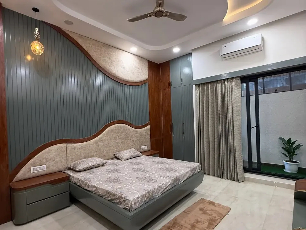 Bedroom with panelled headboard